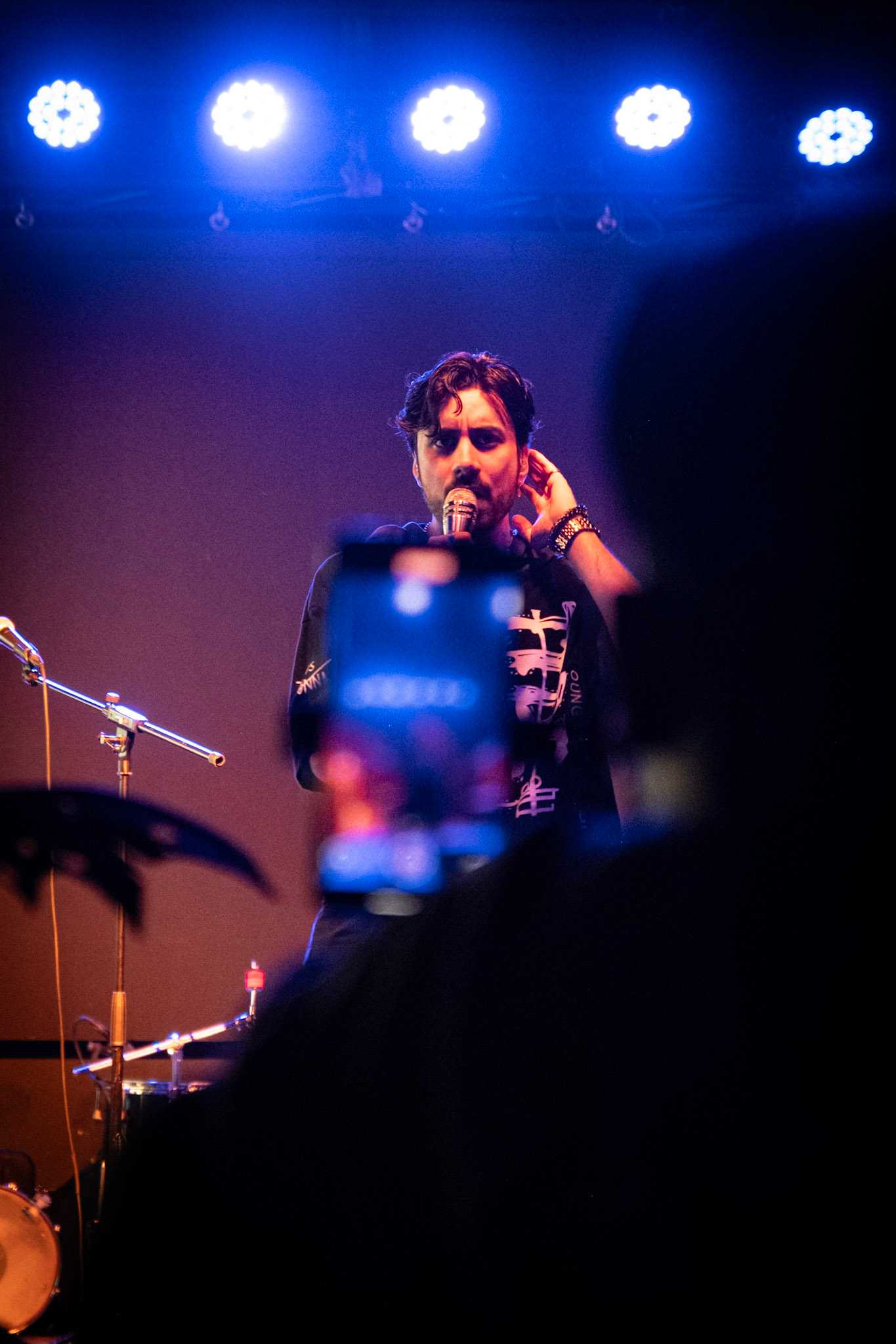 Daniel Michael holding the mic, big audience, Brooklyn Comic-Con 2026, audience member recording him